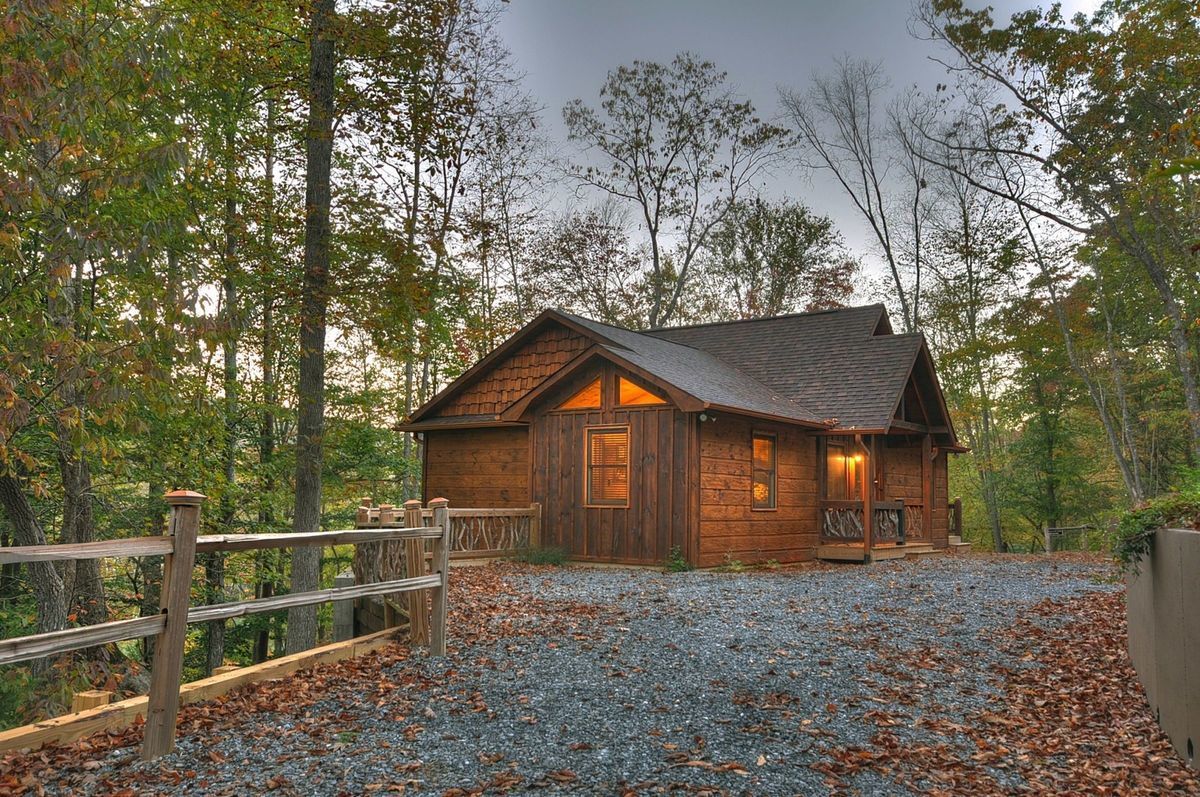This rustic Smoky Mountain cabin gives you ample privacy amid all those beautiful trees.
